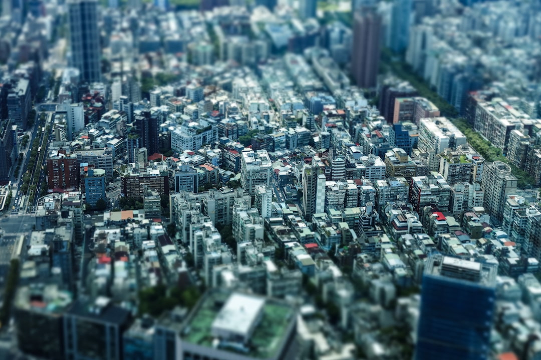 Aerial view of a dense city with numerous buildings.