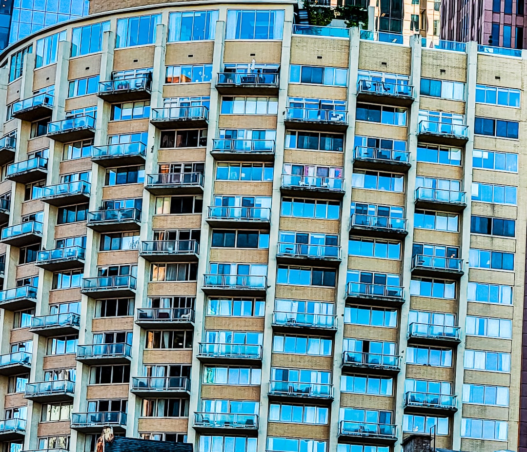 Building with numerous windows in a Spanish urban context.